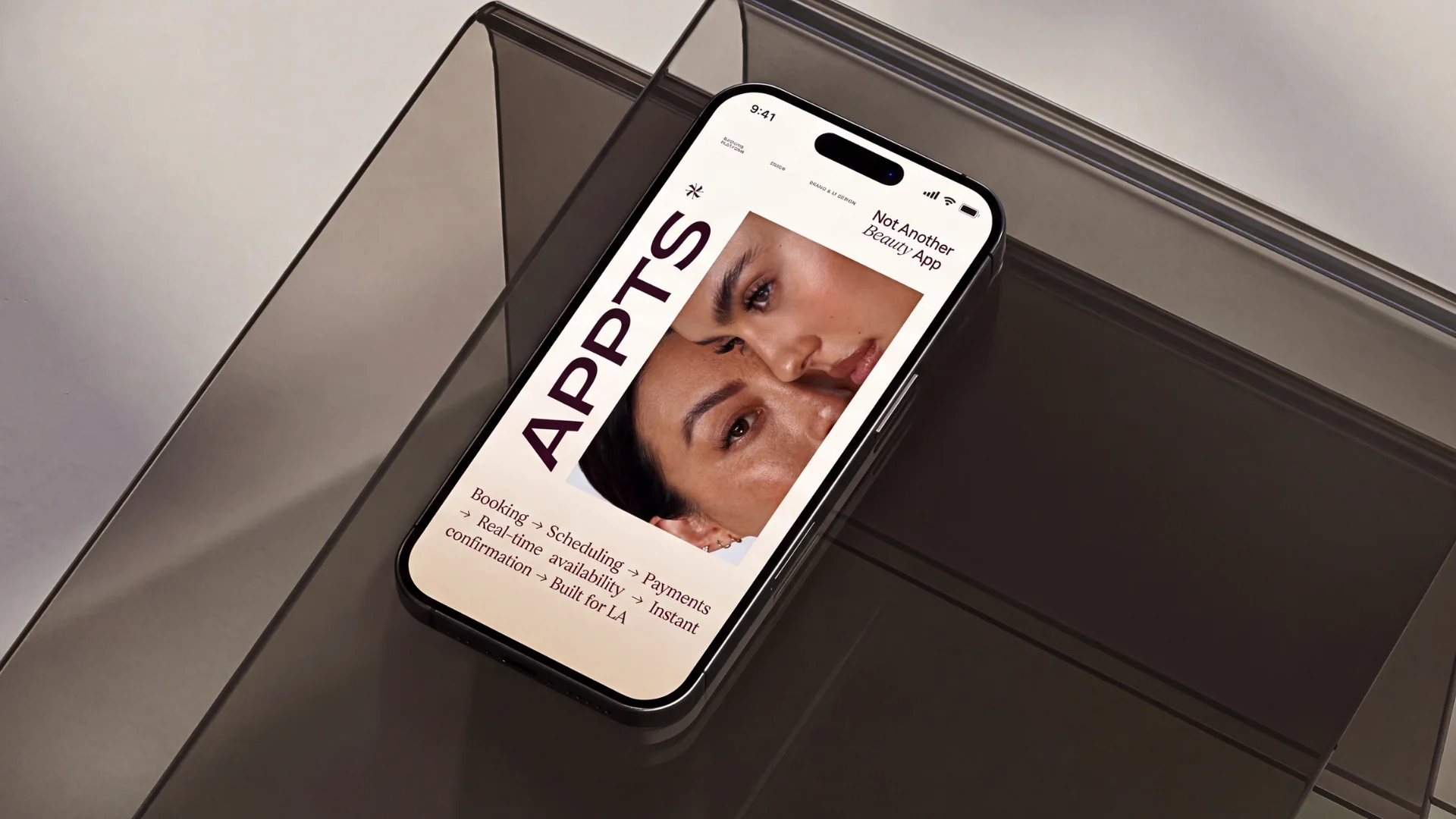 The Appts “Not Another Beauty App” screen on an iPhone resting on smoked glass